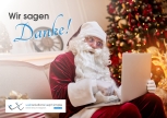 Weihnachtsmann am Notebook, mit Text: "Wir sagen Danke!" - websolutions kept simple